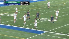 boys playing soccer on a soccer field