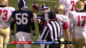 football players in a group on a football field