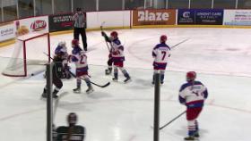 Hockey players playing hockey on ice