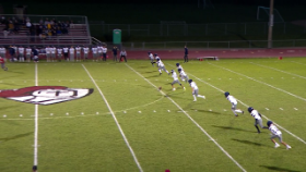 football players running during kickoff