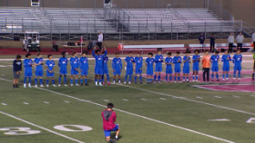 soccer players lined up before game