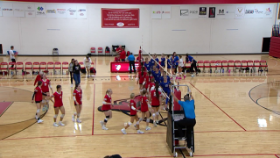 volleyball players shaking hands after game