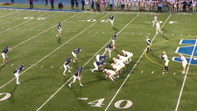football players lined up for a snap