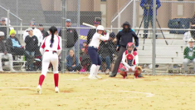 softball player pitching