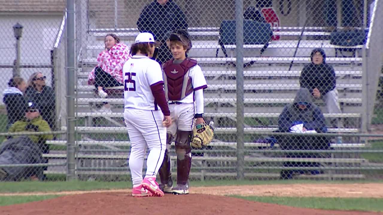 pitcher and catcher talking