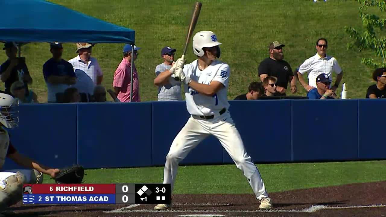 baseball player at bat waiting for a pitch