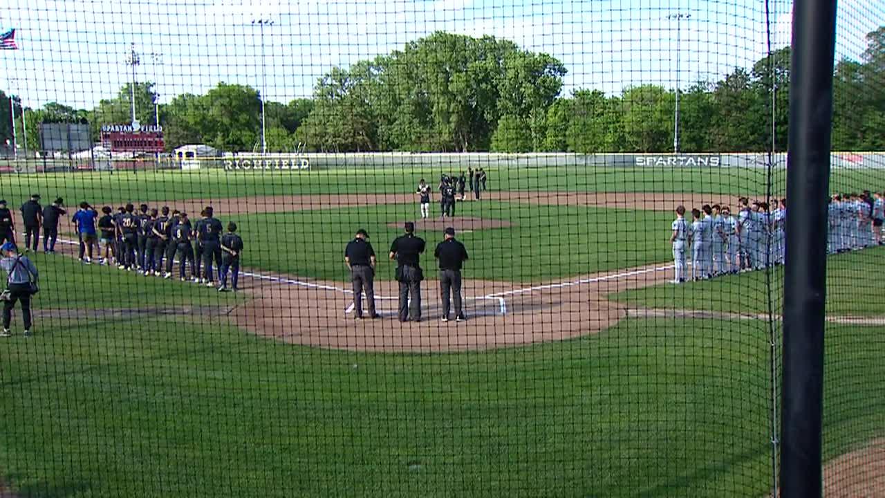 teams lined up for the National Anthem